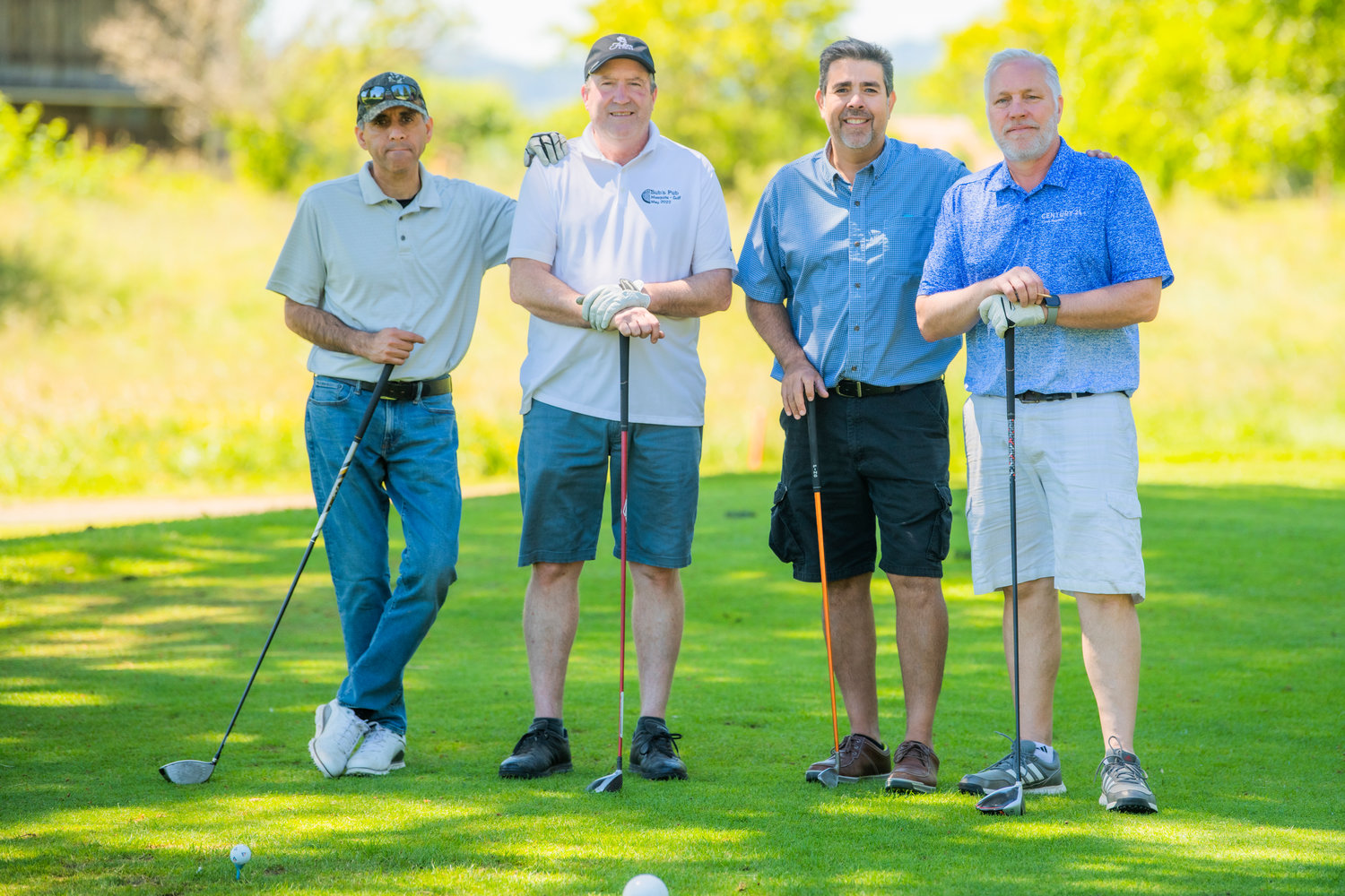 L'équipe Century 21 Lund Realtors pose pour une photo vendredi à Chehalis lors d'un tournoi de golf caritatif pour collecter des fonds pour la Hope Alliance.